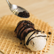 Image for article titled Ben and Jerry's new ice cream burrito is happiness in a waffle wrap